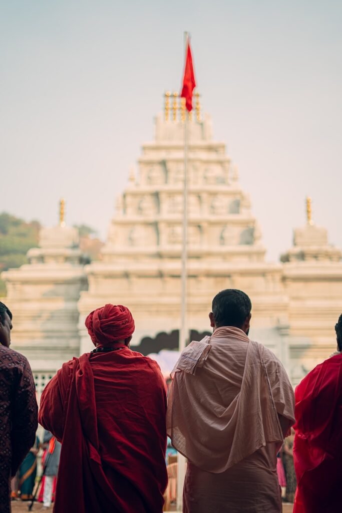 A group of people standing in front of a building