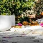 brown glass bottle on white textile