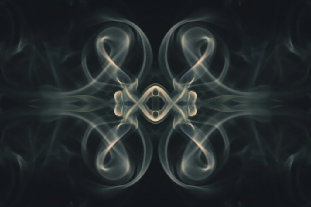 a picture of smoke with a black background